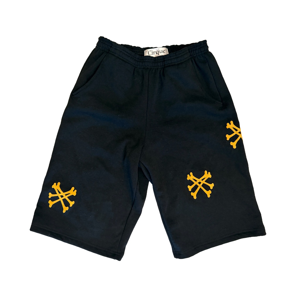 BONES YELLOW ON BLACK CAPRI SHORTS